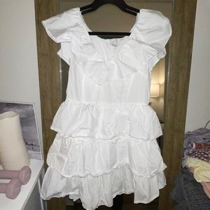 A New Day. White ruffle mini dress